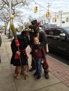 Chimney sweepers from the xmas play walking down Main St